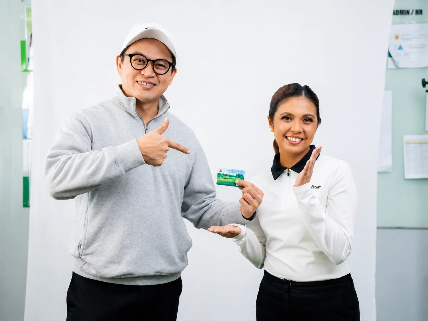 A membership card being presented during a client handover